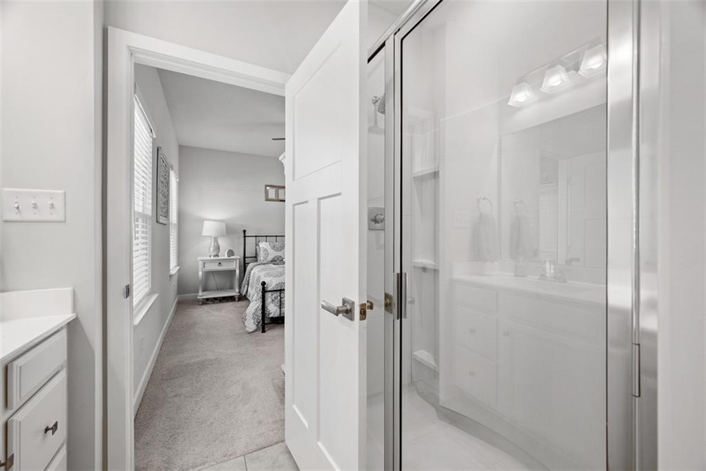 309 Helenium Drive Mars, PA 16046 - Photo 23 of 37 A large walk in glassed shower with dual shower heads is sure to please.