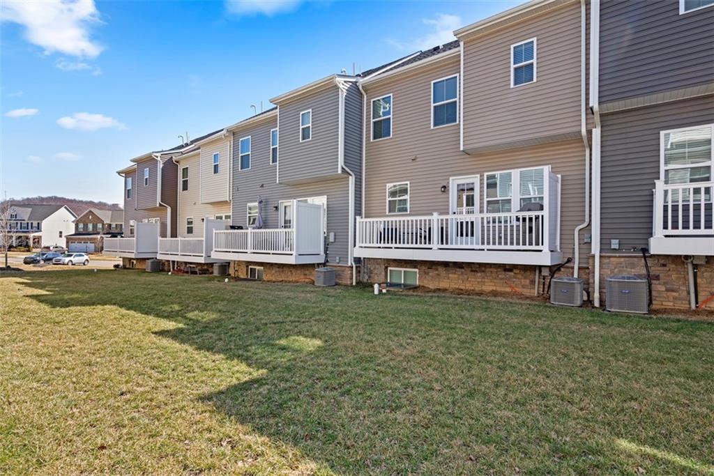 309 Helenium Drive Mars, PA 16046 - Photo 33 of 37 Level yard space is found behind the unit.