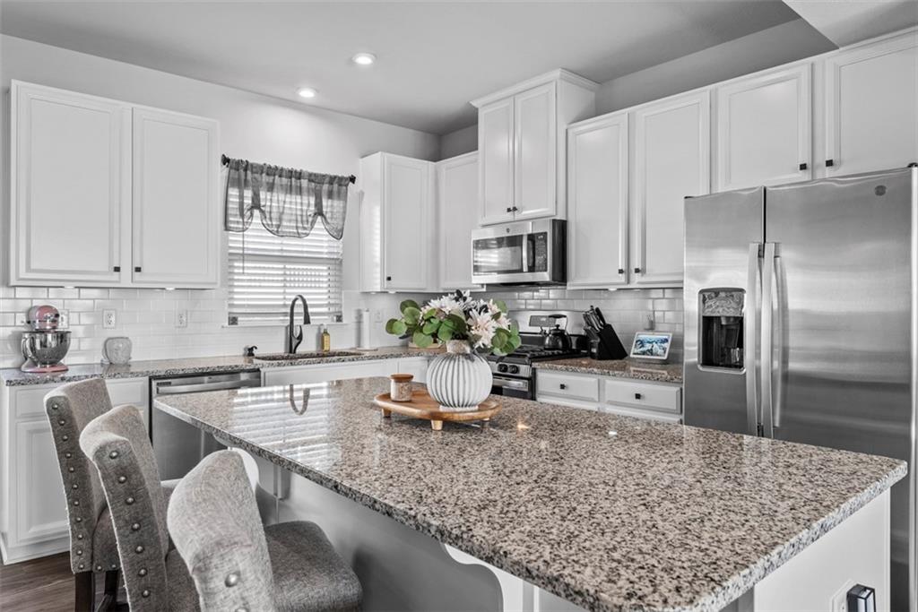 309 Helenium Drive Mars, PA 16046 - Photo 5 of 37 Imagine yourself starting the day with a hot cup of coffee at this generous size island the comfortably fits 3 or 4 people.