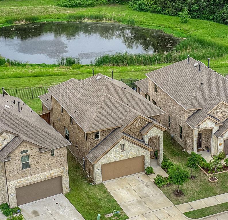 an aerial view of a house with garden