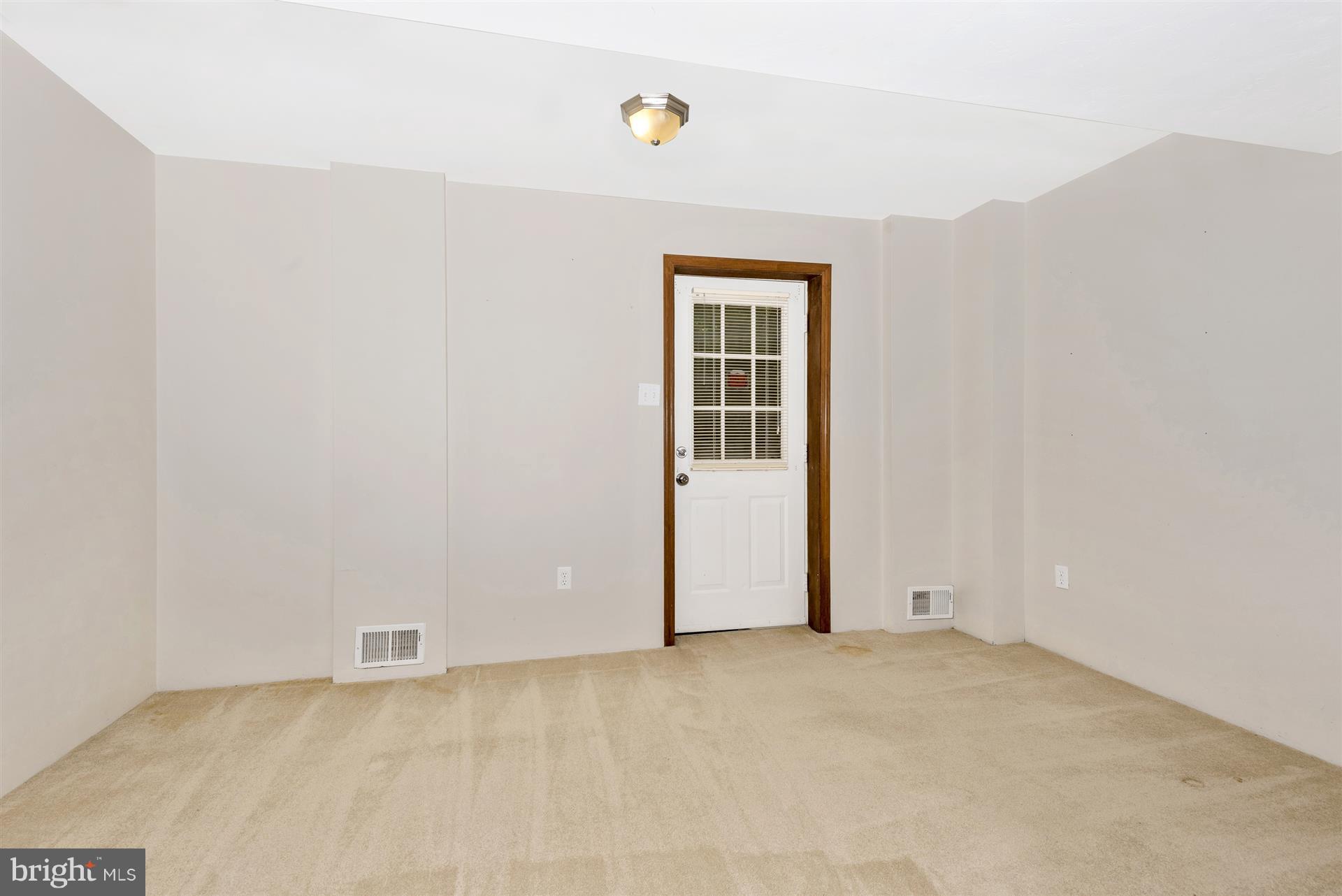 2 West Road Mount Airy, MD 21771 - Photo 22 of 28 Den / Play Room (w/door out to back yard)