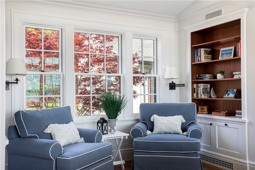 415 Poppasquash Road Bristol, RI 02809 - Photo 11 of 50 Living room additional seating and built-ins
