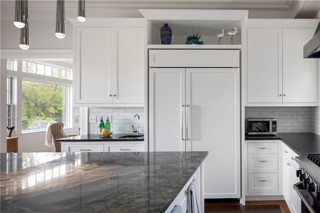 415 Poppasquash Road Bristol, RI 02809 - Photo 16 of 50 Subzero custom wood paneled refrigerator with wet-bar to the left
