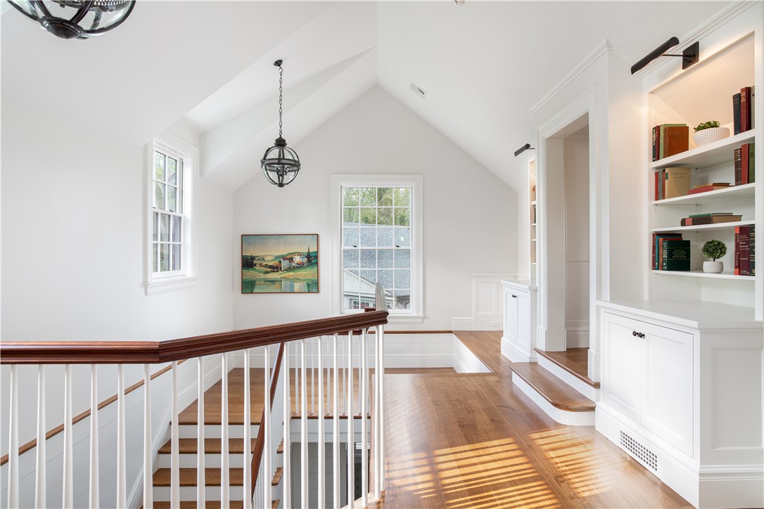 415 Poppasquash Road Bristol, RI 02809 - Photo 26 of 50 Expansive second level landing with built-ins.