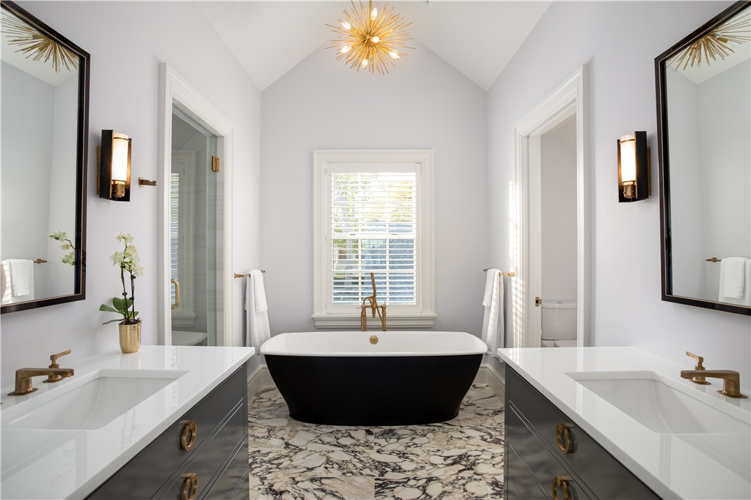 415 Poppasquash Road Bristol, RI 02809 - Photo 31 of 50 Master bathroom boasts dual vanities with a relaxing steam shower and sumptuous soaking tub