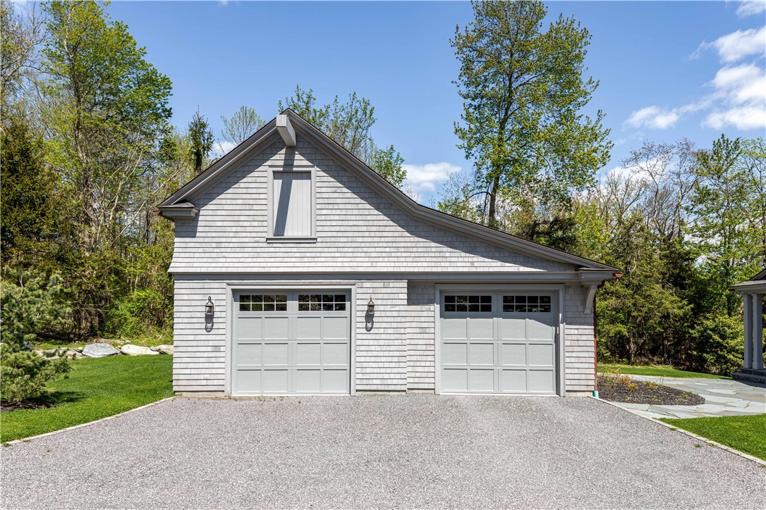 415 Poppasquash Road Bristol, RI 02809 - Photo 41 of 50 Custom garage with water views and room for your toys or work area