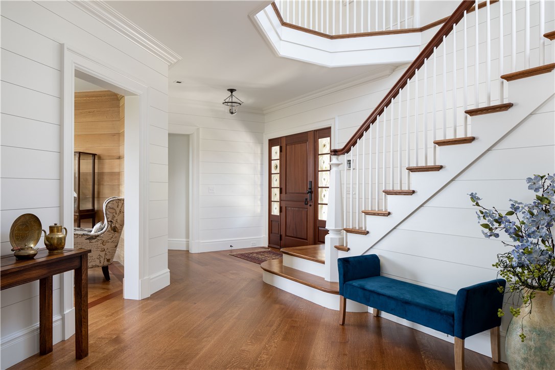 415 Poppasquash Road Bristol, RI 02809 - Photo 7 of 50 Stunning ship-lapped walls with dutch door surrounded by bullnose glass makes for a truly exquisite and welcoming foyer.