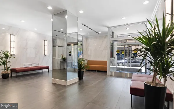 a view of a living room and dining room