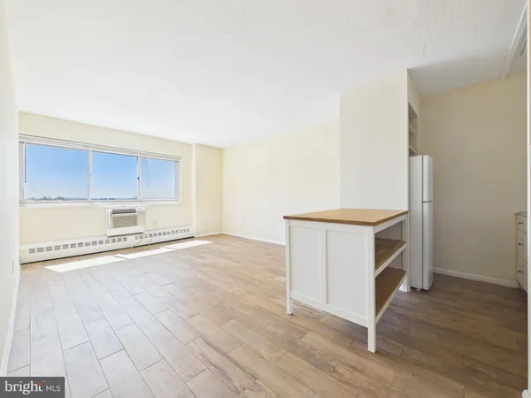 a view of a kitchen with a sink cabinets and a window