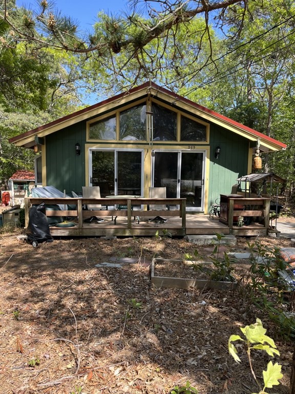 359 Cotuit Road Mashpee, MA 02649 - Photo 1 of 2 a front view of a house with a yard