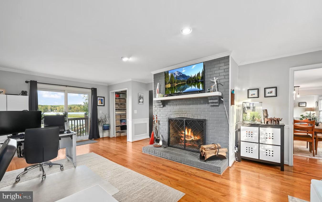 18505 Cabin Road Triangle, VA 22172 - Photo 18 of 40 a living room with furniture and a fireplace