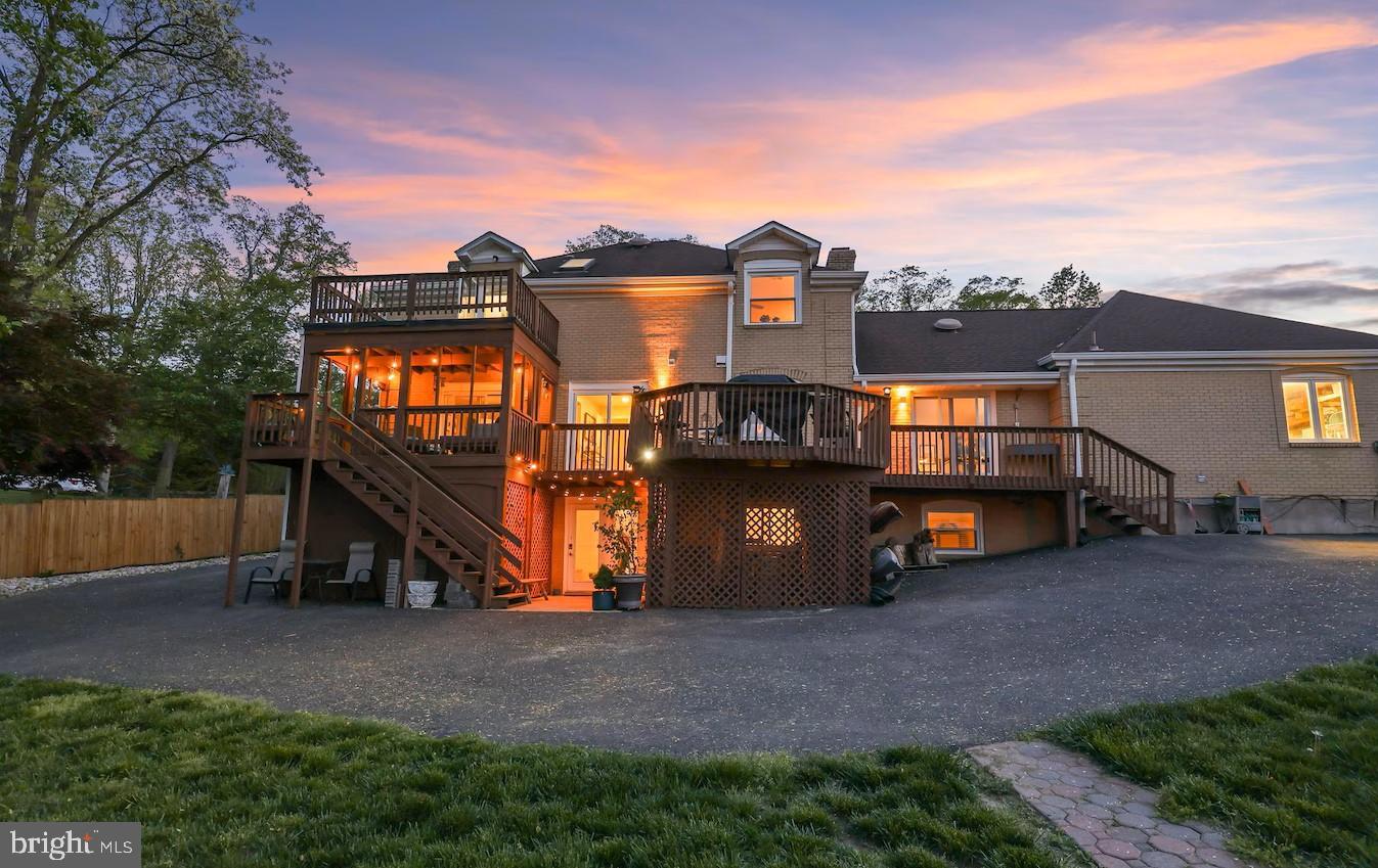 18505 Cabin Road Triangle, VA 22172 - Photo 4 of 40 a view of a house with a yard from a lake
