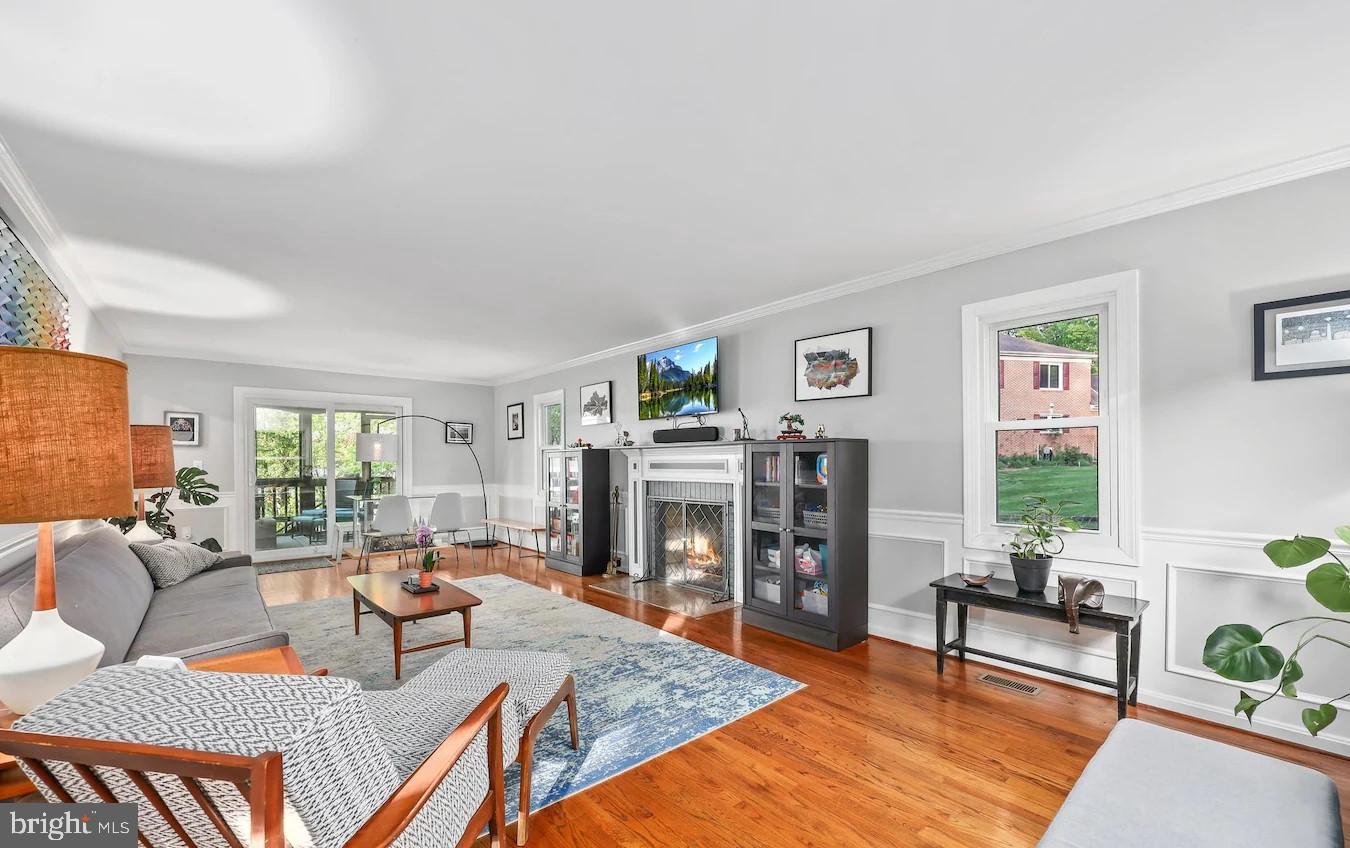 18505 Cabin Road Triangle, VA 22172 - Photo 7 of 40 a living room with fireplace furniture and a fireplace