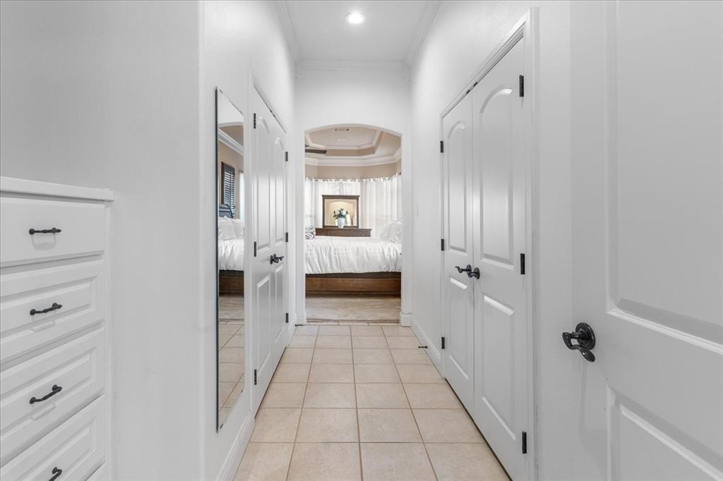 117 Redtail Court Weatherford, TX 76088 - Photo 24 of 39 a view of a hallway with closet and cabinet