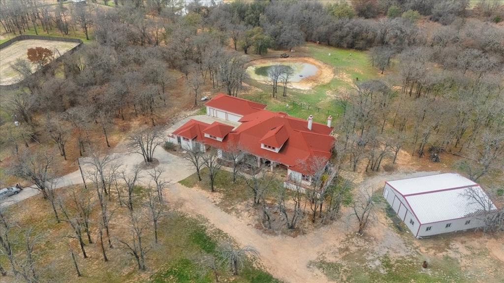 117 Redtail Court Weatherford, TX 76088 - Photo 37 of 39 an aerial view of a house with a yard