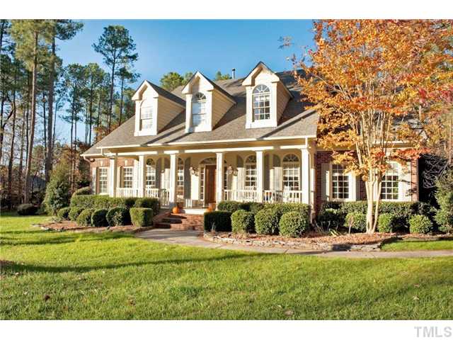 5801 Orchid Valley Road Raleigh, NC 27613 - Photo 1 of 25 a front view of a house with a yard
