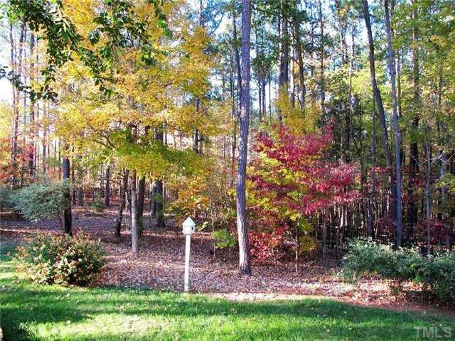 5801 Orchid Valley Road Raleigh, NC 27613 - Photo 18 of 25 a view of a backyard with garden