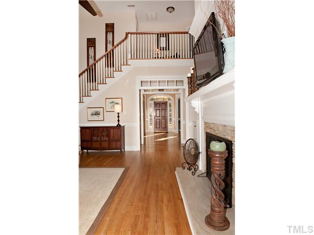 5801 Orchid Valley Road Raleigh, NC 27613 - Photo 6 of 25 a view of a living room with furniture and a fireplace