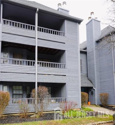 a view of a house with a balcony