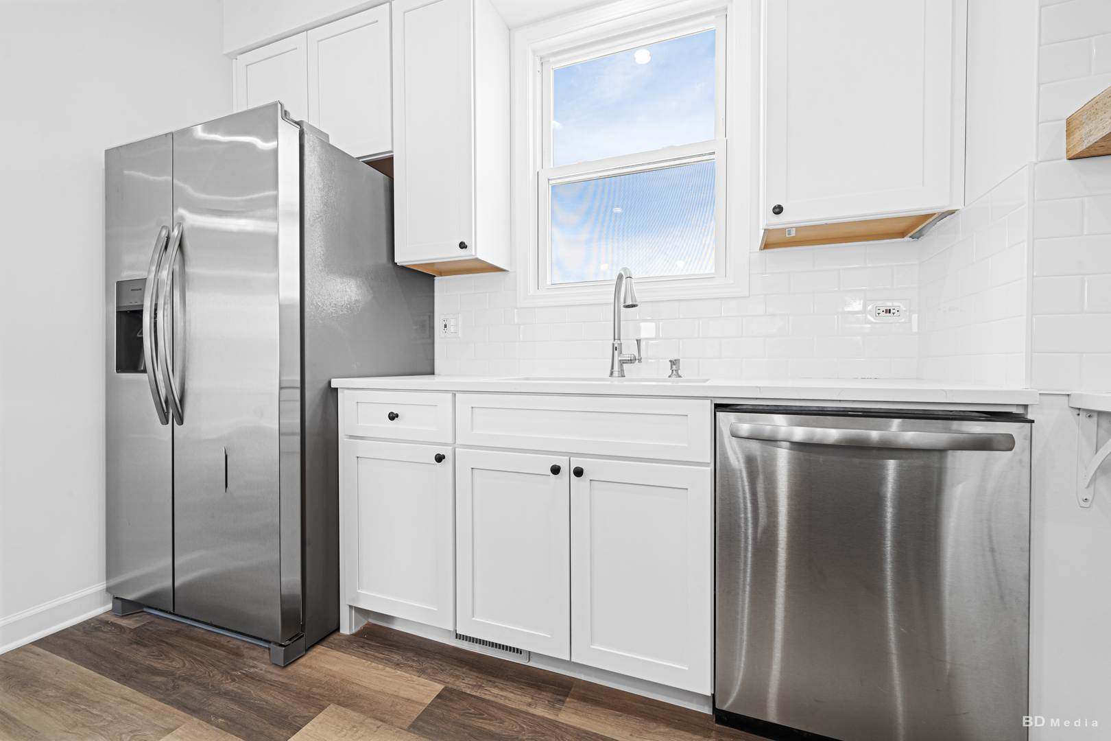 18445 Kedzie Avenue Homewood, IL 60430 - Photo 12 of 37 a kitchen with stainless steel appliances a refrigerator and cabinets