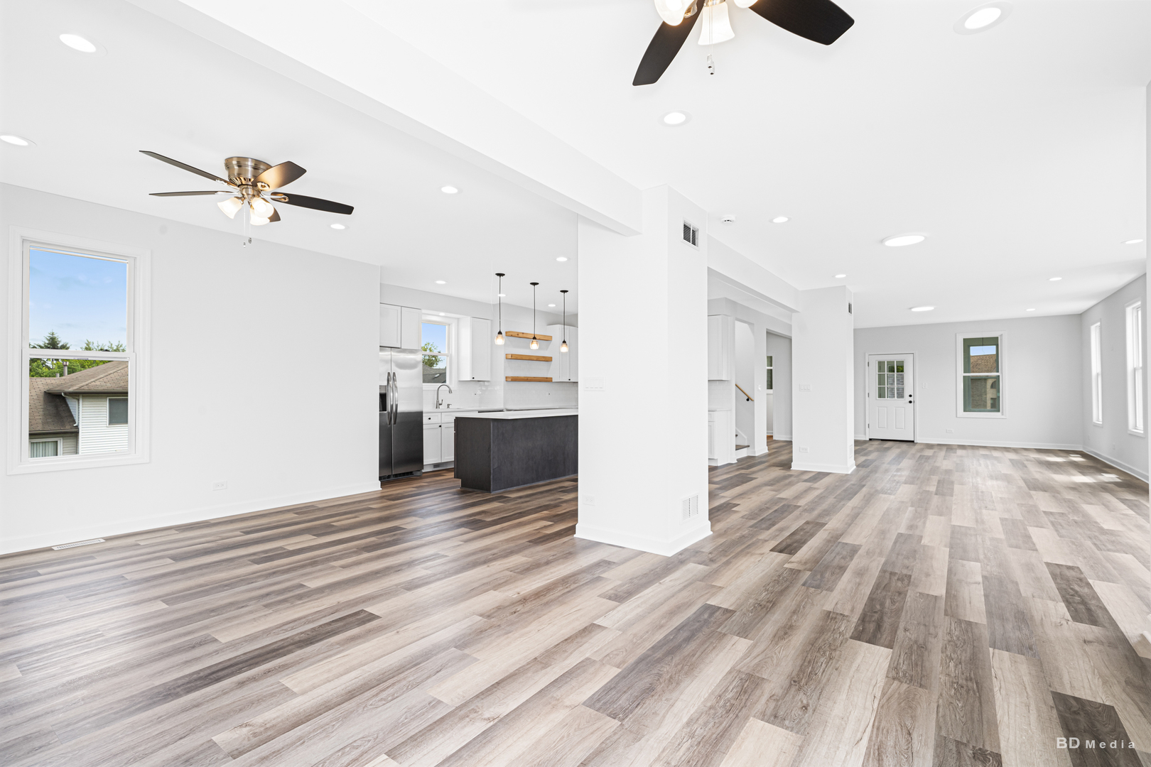 18445 Kedzie Avenue Homewood, IL 60430 - Photo 17 of 37 a view of empty room with wooden floor and ceiling fan