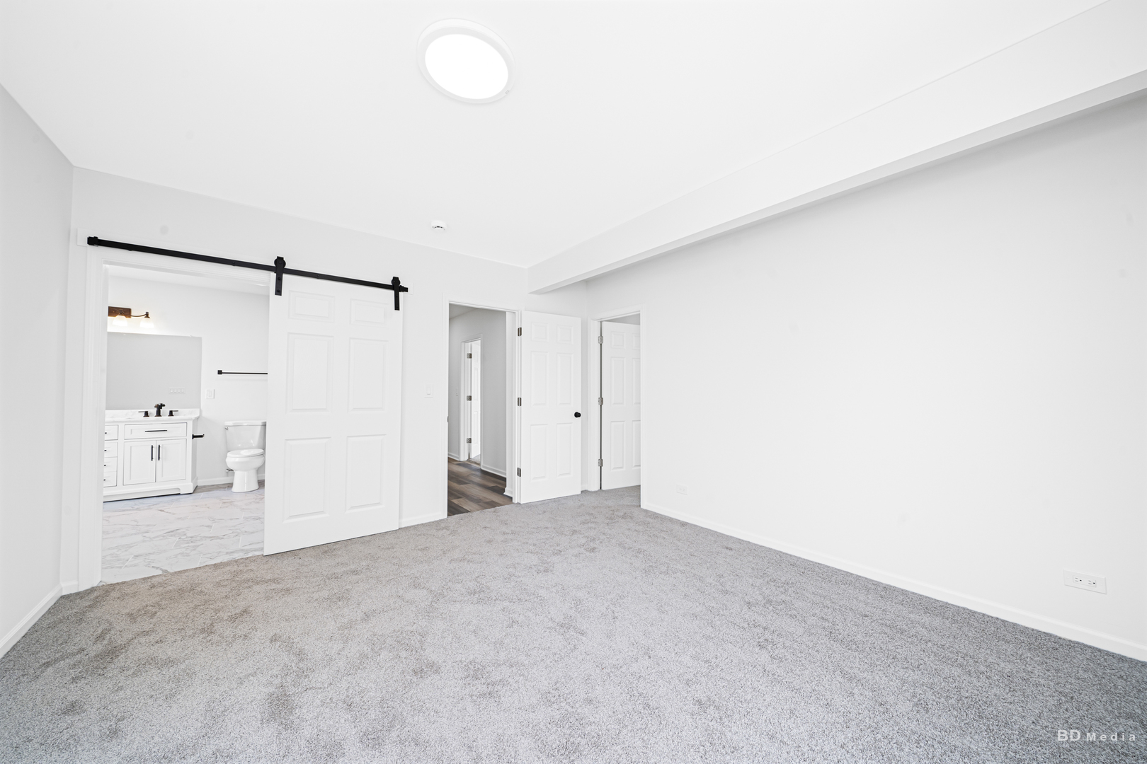 18445 Kedzie Avenue Homewood, IL 60430 - Photo 24 of 37 a view of a big room with closet and a chandelier fan