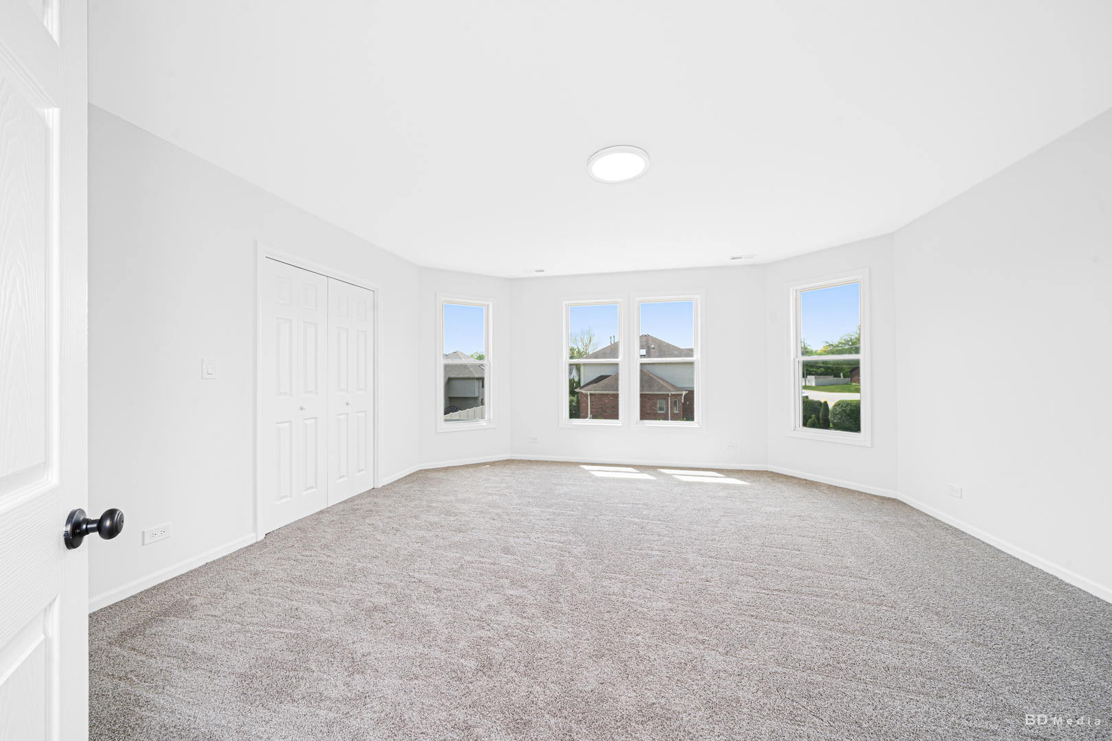 18445 Kedzie Avenue Homewood, IL 60430 - Photo 25 of 37 an empty room with a windows and closet
