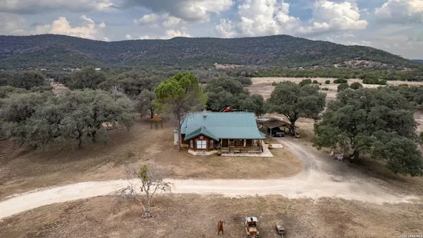 a view of a dry yard with mountain