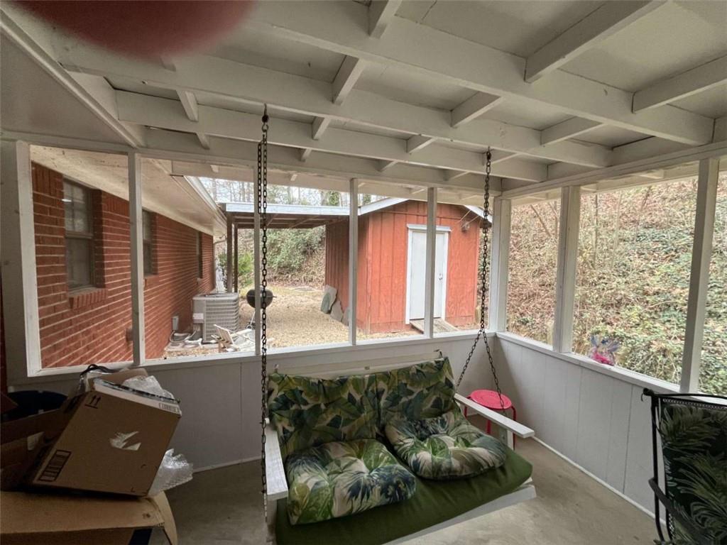 33 East Kenora Drive Southwest Rome, GA 30165 - Photo 13 of 30 a living room with furniture and a large window