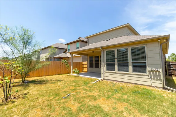 a front view of a house with a outdoor space