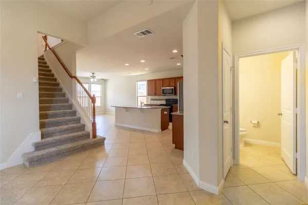 a view of a kitchen with kitchen and windows
