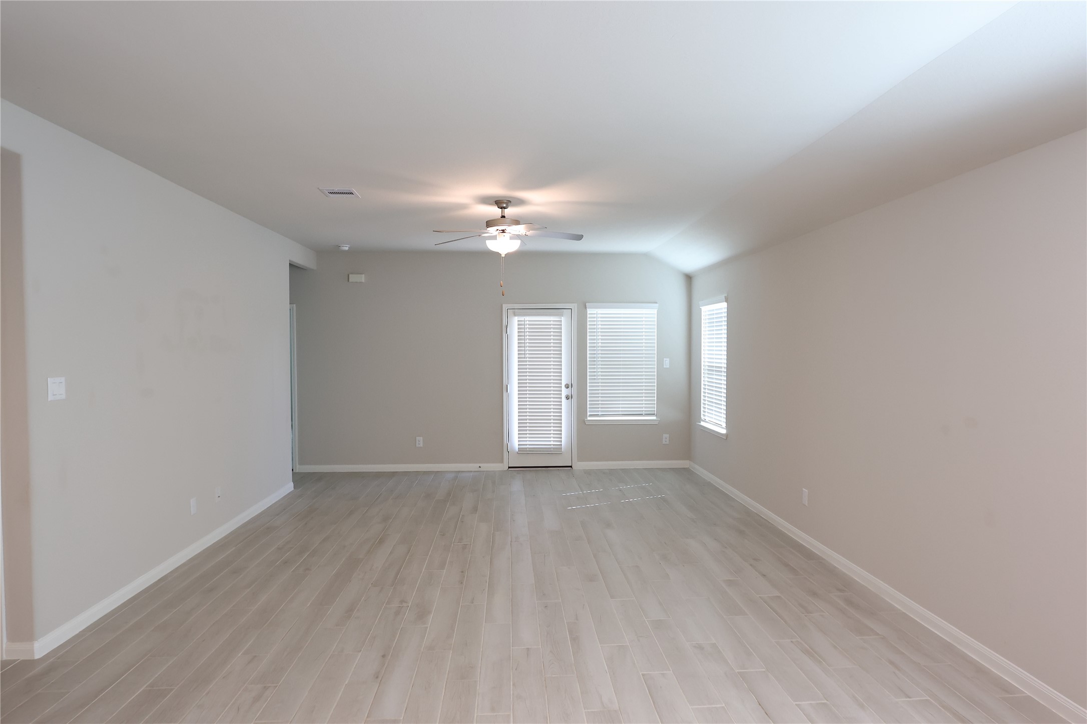 906 Pismo Lane Rosharon, TX 77583 - Photo 6 of 15 a view of an empty room with a chandelier fan