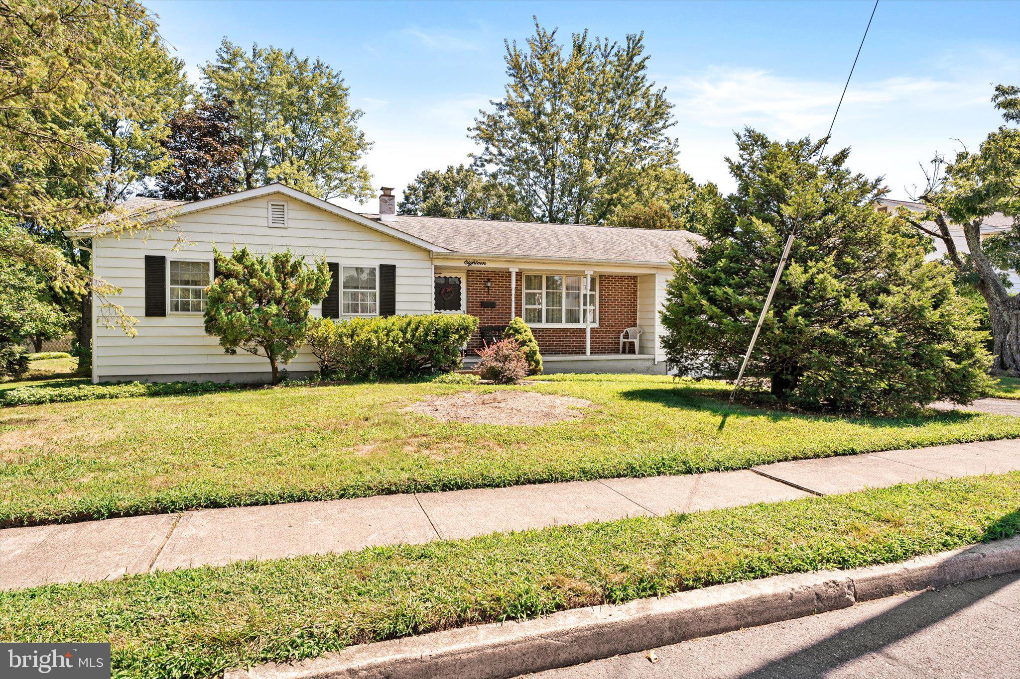 18 Compton Way Hamilton, NJ 08690 - Photo 1 of 28 a front view of a house with garden