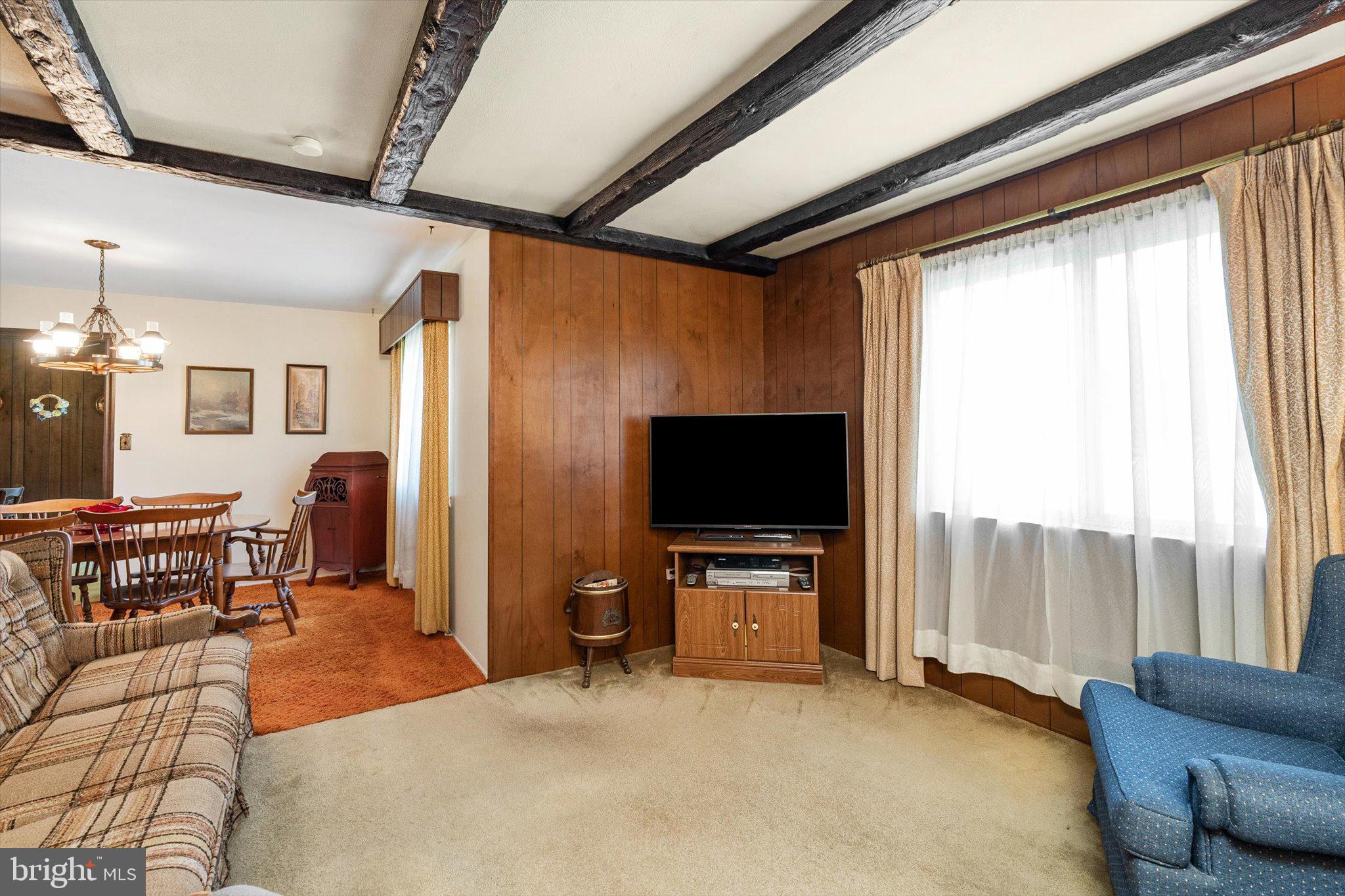 18 Compton Way Hamilton, NJ 08690 - Photo 11 of 28 a living room with furniture and a flat screen tv