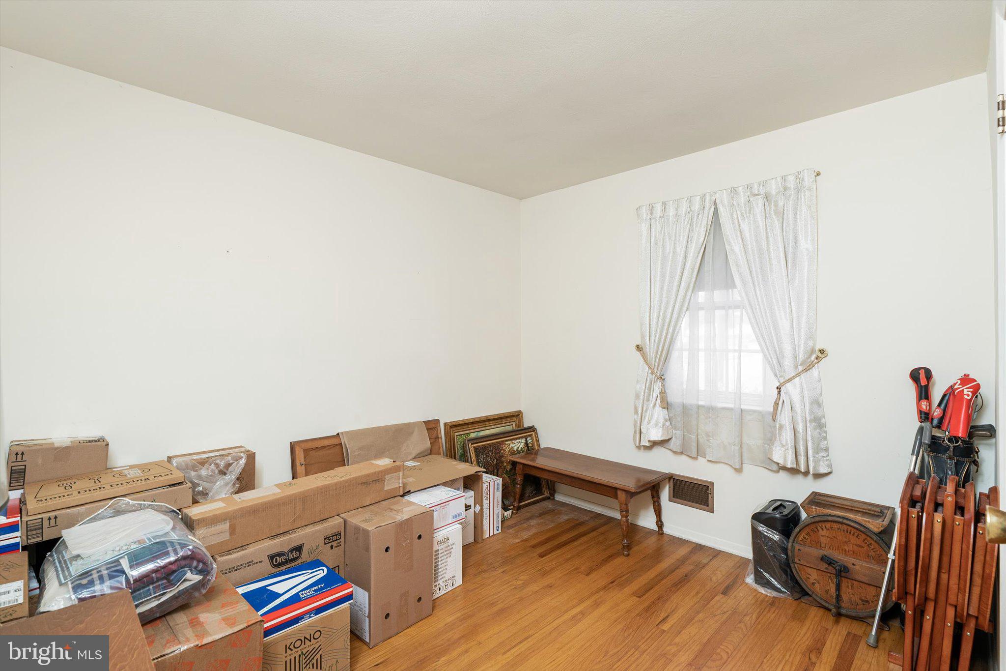 18 Compton Way Hamilton, NJ 08690 - Photo 21 of 28 a living room with furniture and a wooden floor