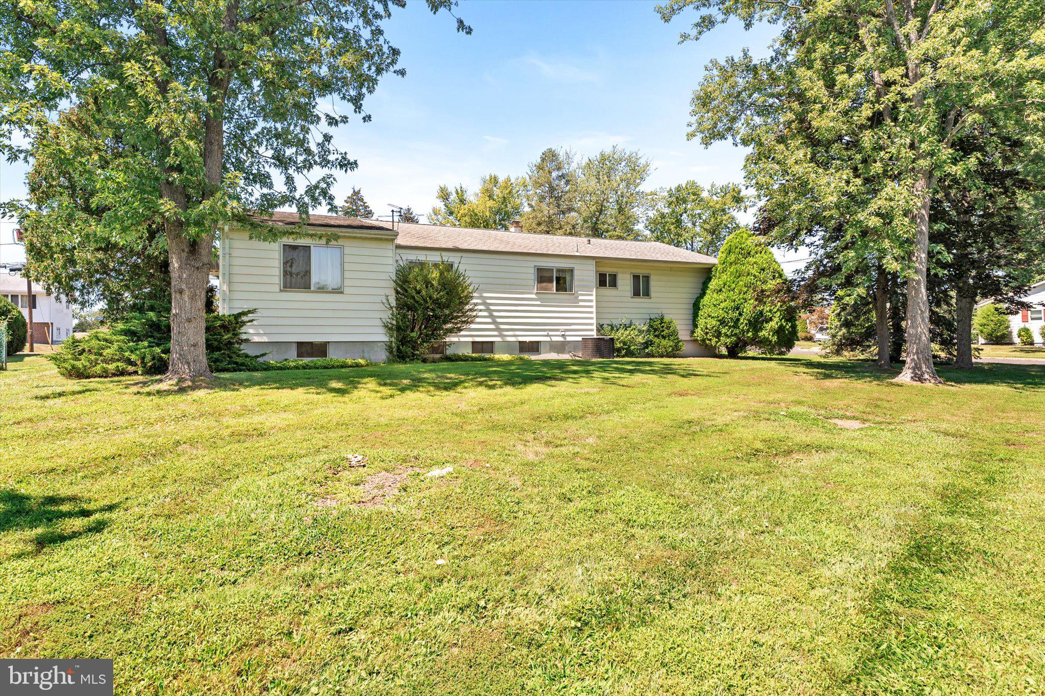 18 Compton Way Hamilton, NJ 08690 - Photo 27 of 28 a view of a house with a yard and tree s
