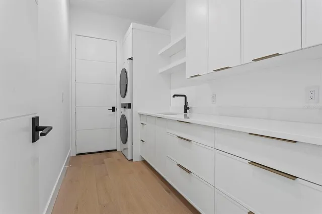 a bathroom with a sink and mirror