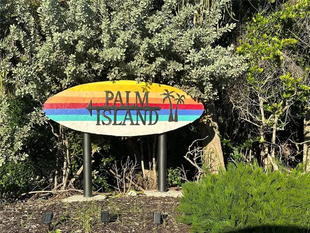 a view of a swimming pool with a yard