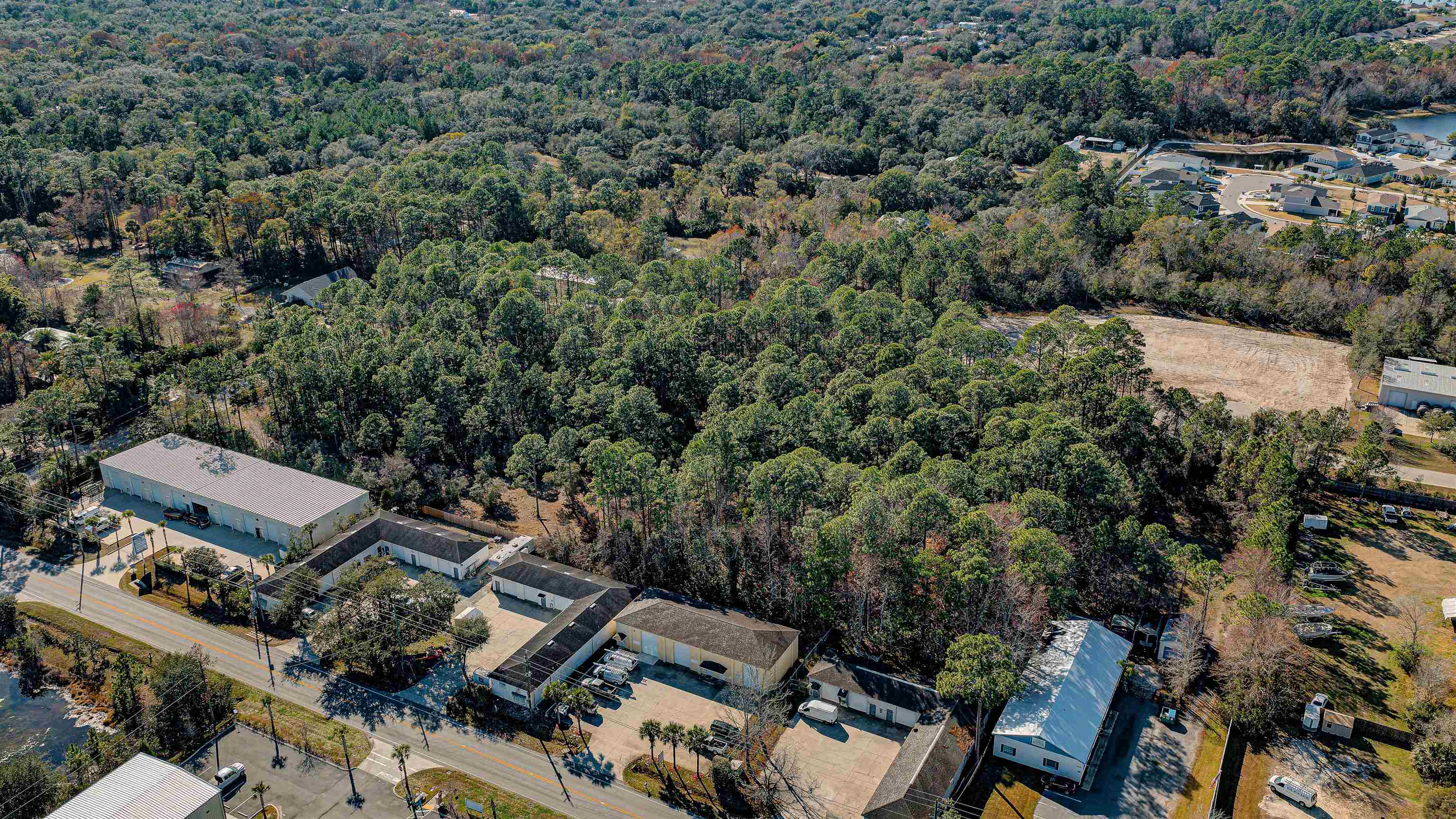 724 Cypress Road St. Augustine, FL 32086 - Photo 4 of 7 Aerial overview of property's location featuring a forest