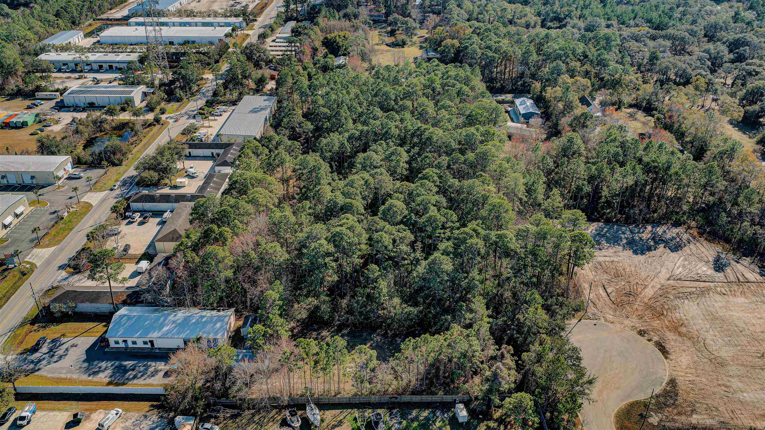 724 Cypress Road St. Augustine, FL 32086 - Photo 5 of 7 Aerial view of a heavily wooded area