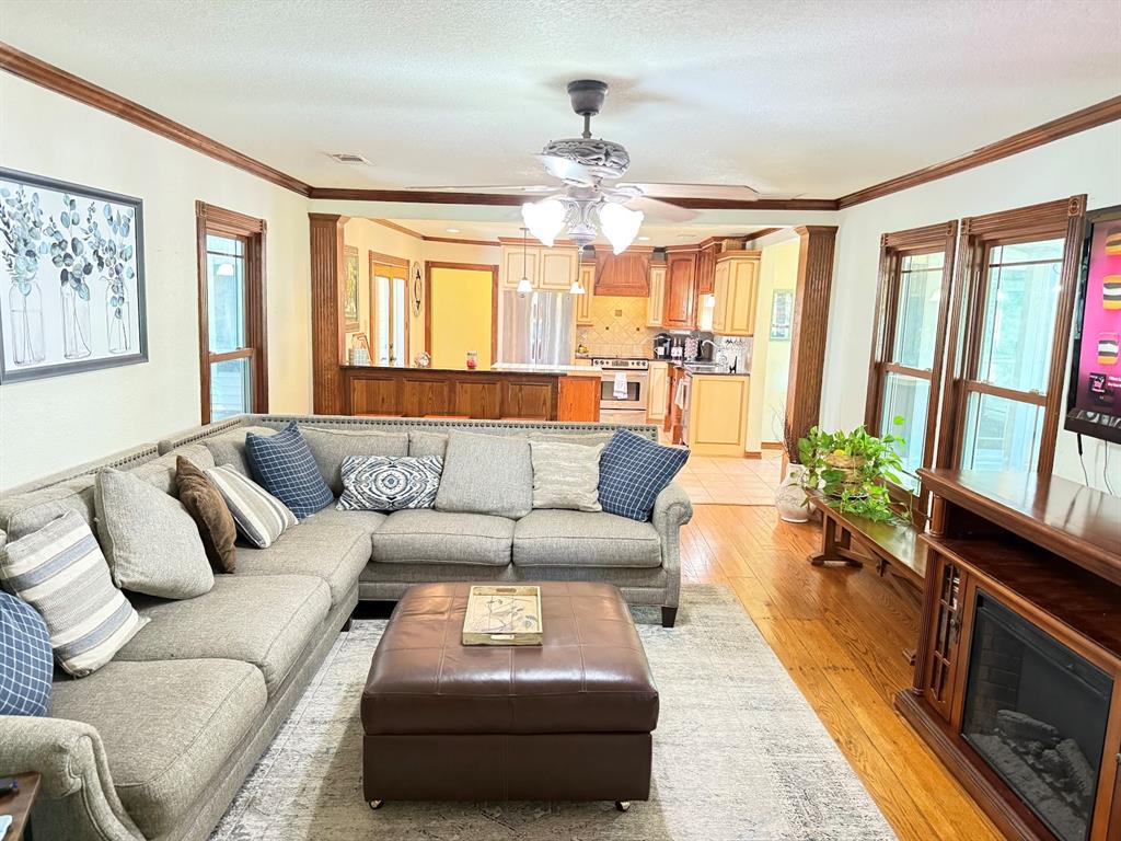 3420 Springfield Road Springtown, TX 76082 - Photo 20 of 38 a living room with furniture and a large window