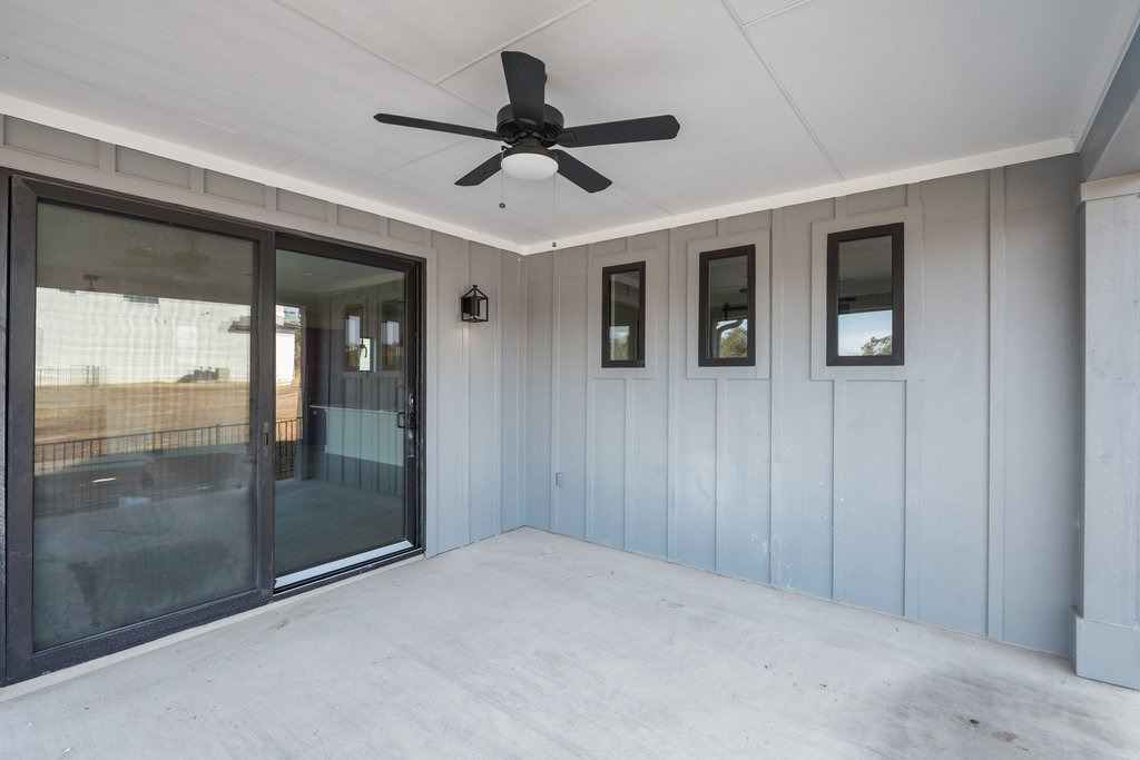 711 Paleface Ranch Road, Unit 9 Spicewood, TX 78669 - Photo 21 of 30 View of patio / terrace with a ceiling fan