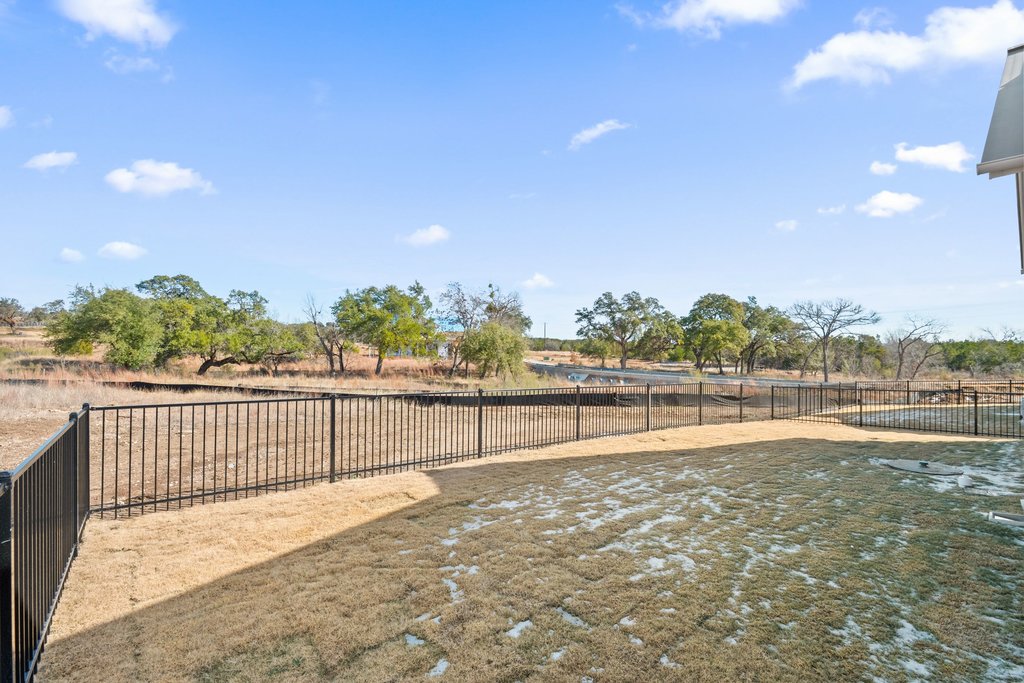 711 Paleface Ranch Road, Unit 9 Spicewood, TX 78669 - Photo 22 of 30 View of yard featuring a patio