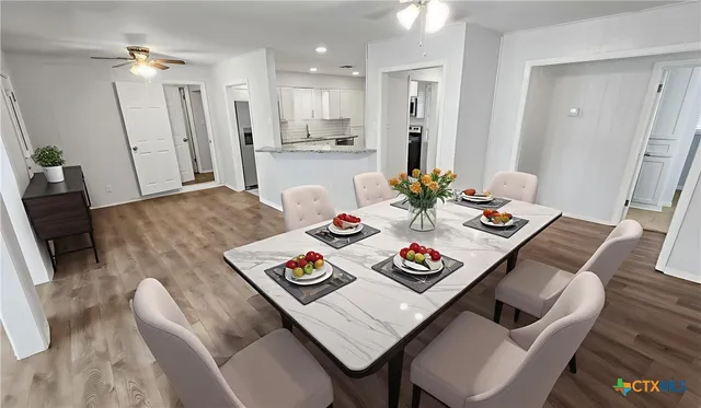 a view of a dining room and furniture