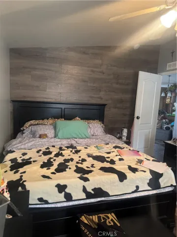 a table with chairs and a wooden floor