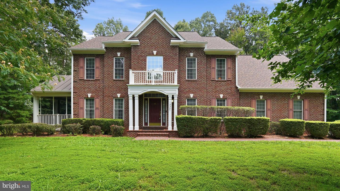 13301 Dumfries Road Manassas, VA 20112 - Photo 1 of 49 Elegant brick home in lush surroundings.