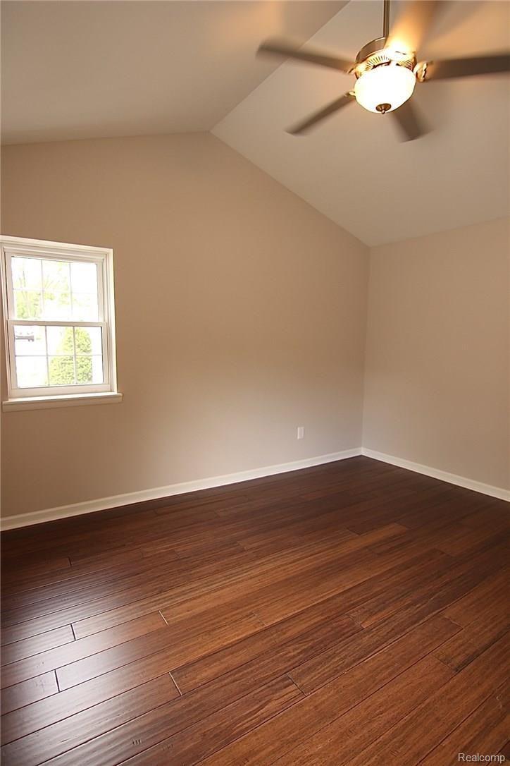 931 West 3rd Street Rochester, MI 48307 - Photo 51 of 62 Master bdrm. has several windows and leads to an awesome walk-in closet with vaulted ceiling, recessed lighting and window.