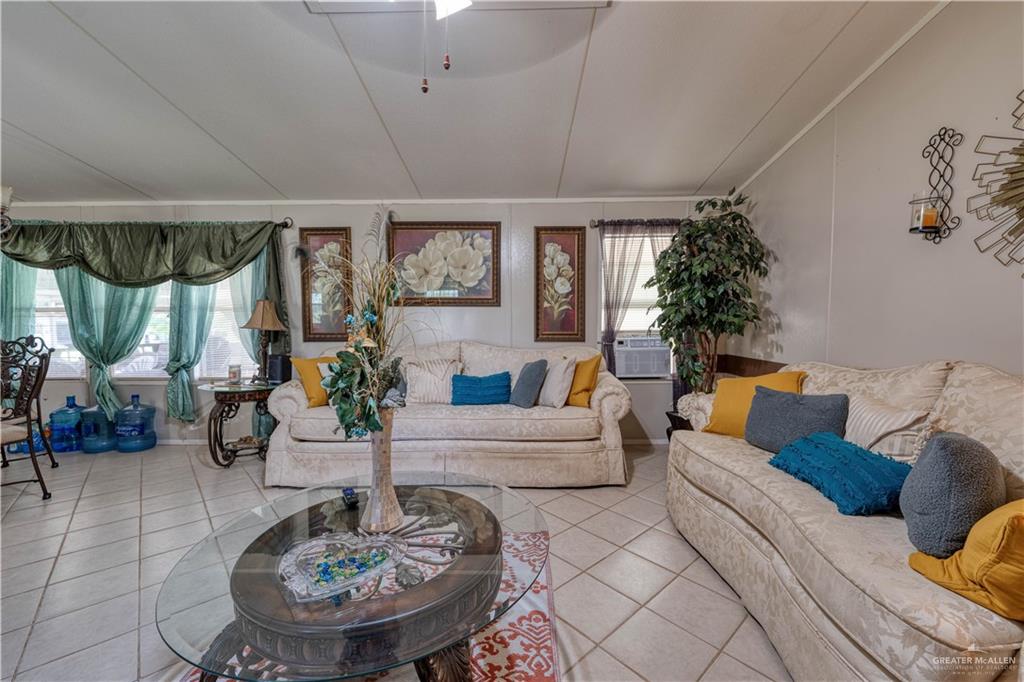 220 Delmita Road Delmita, TX 78536 - Photo 20 of 33 a living room with furniture and a large window