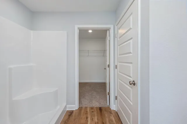 a view of a room with racks on the wall