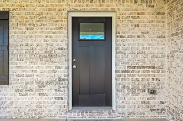 a bathroom with a sink and a shower